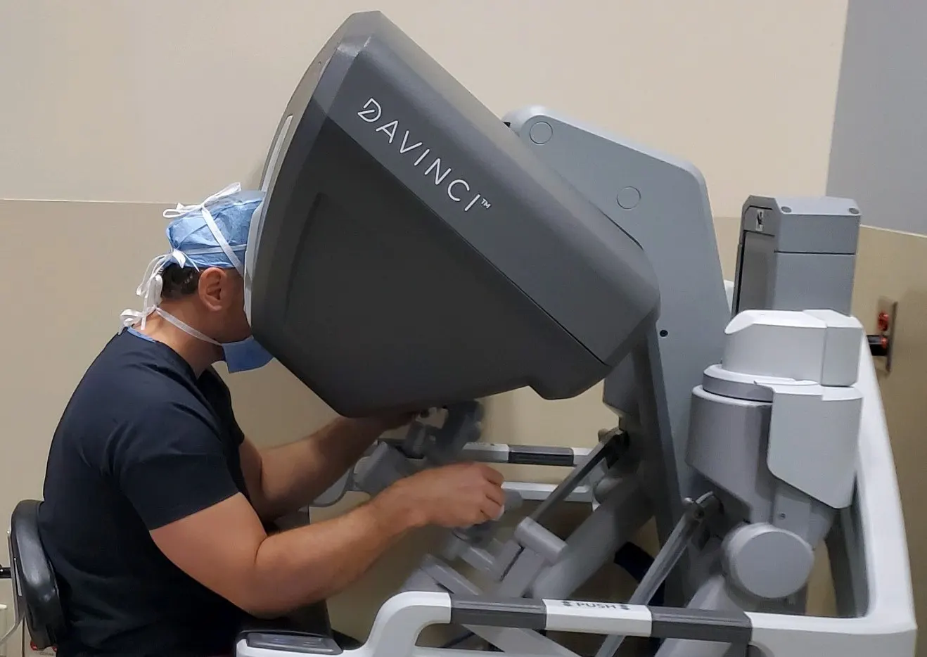 Dr. Steven Williams operating the da Vinci Robotic Surgery machine